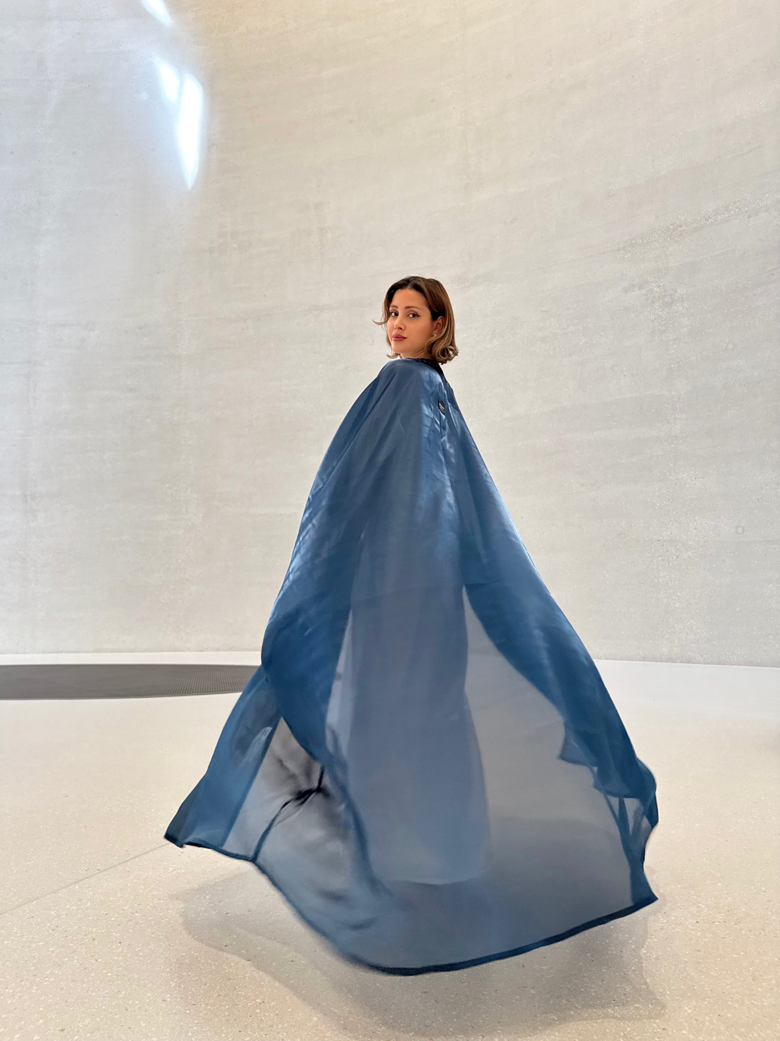 Blue organza Abaya with a white Dress
