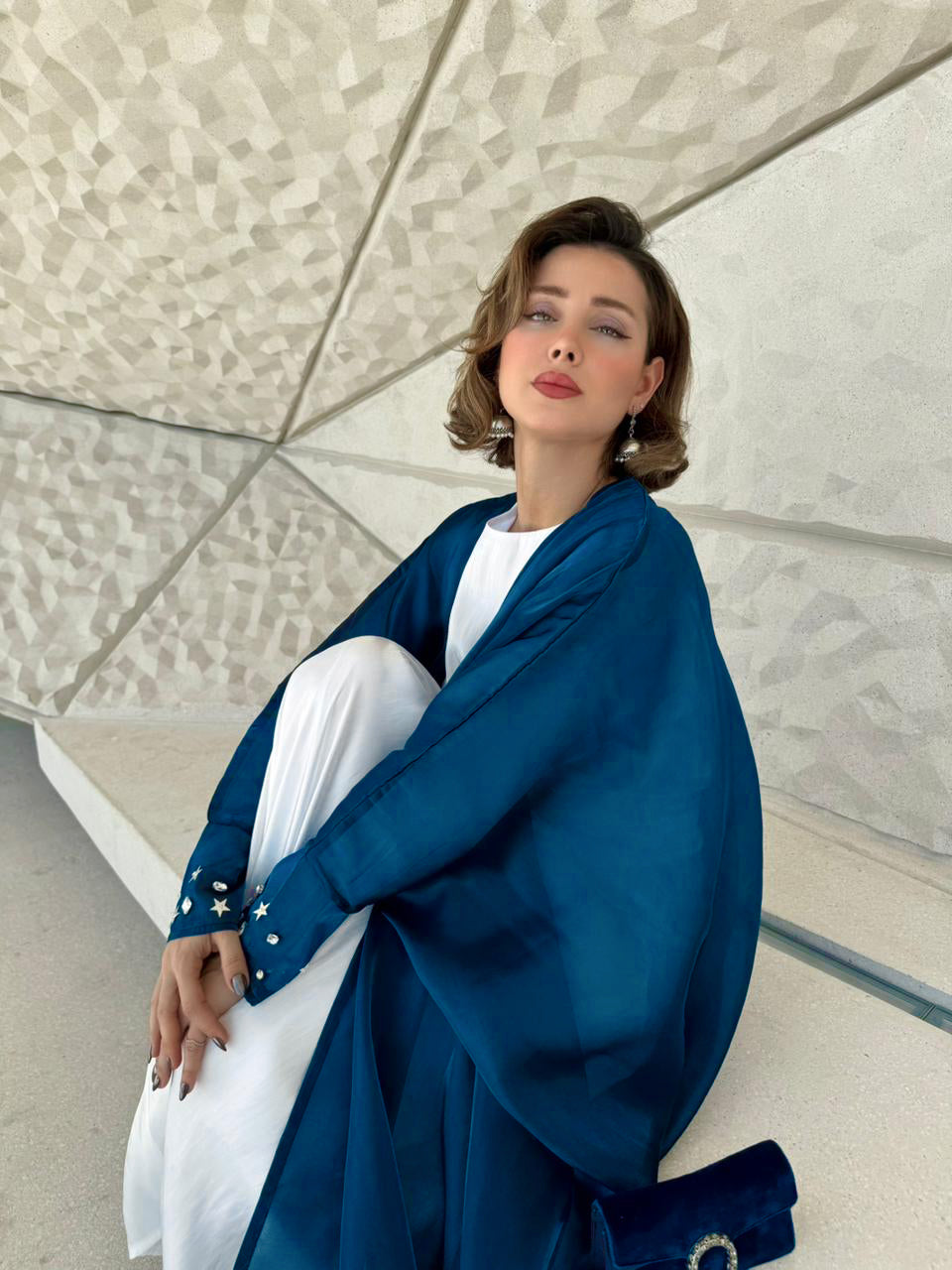 Blue organza Abaya with a white Dress